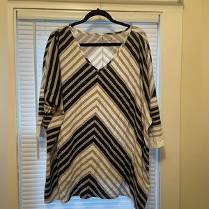 Woman within tunic top